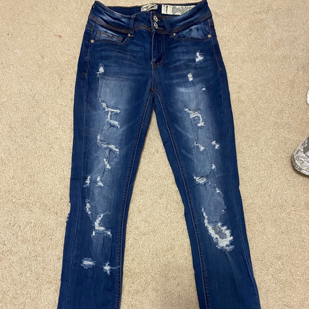 dark washed ripped jeans